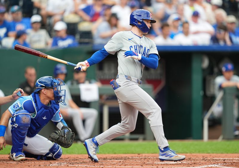 Jul 28, 2024; Kansas City, Missouri, USA; Chicago Cubs center fielder Pete Crow-Armstrong (52) hits a single against the Kansas City Royals during the third inning at Kauffman Stadium. Mandatory Credit: Jay Biggerstaff-USA TODAY Sports