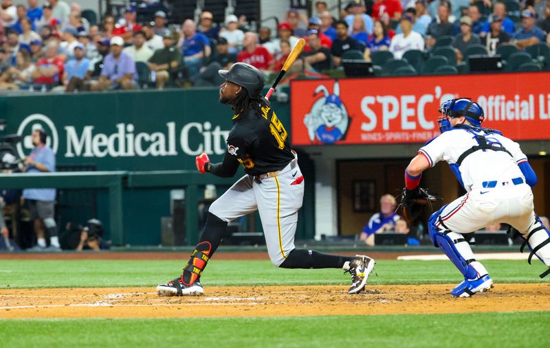 Aug 20, 2024; Arlington, Texas, USA; Pittsburgh Pirates designated hitter Oneil Cruz (15) hits an rbi triple during the fourth inning against the Texas Rangers at Globe Life Field. Mandatory Credit: Kevin Jairaj-USA TODAY Sports