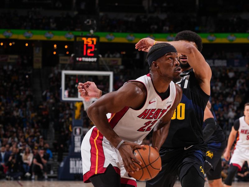 DENVER, CO - FEBRUARY 29: Jimmy Butler #22 of the Miami Heat drives to the basket during the game against the Denver Nuggets on February 29, 2024 at the Ball Arena in Denver, Colorado. NOTE TO USER: User expressly acknowledges and agrees that, by downloading and/or using this Photograph, user is consenting to the terms and conditions of the Getty Images License Agreement. Mandatory Copyright Notice: Copyright 2024 NBAE (Photo by Bart Young/NBAE via Getty Images)