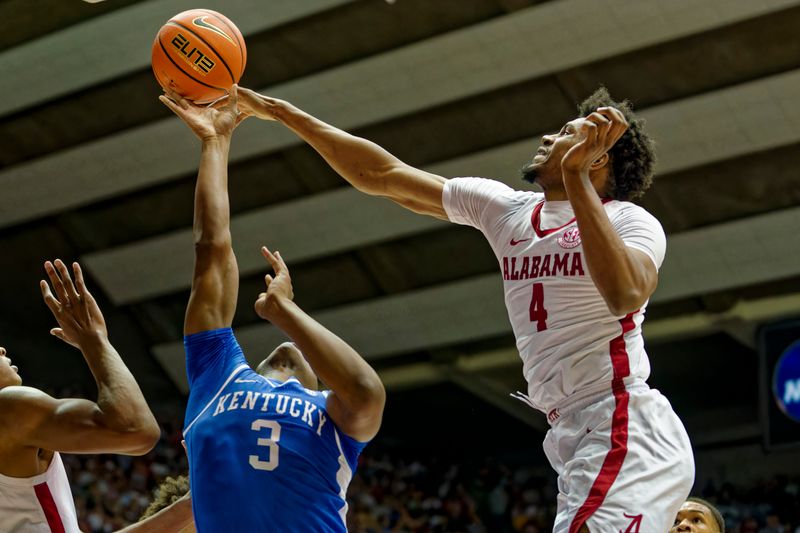 Jan 7, 2023; Tuscaloosa, Alabama, USA; Kentucky Wildcats guard Adou Thiero (3) shoots against Alabama Crimson Tide forward Noah Gurley (4) during first half at Coleman Coliseum. Mandatory Credit: Marvin Gentry-USA TODAY Sports