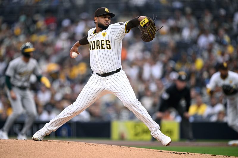 Jun 11, 2024; San Diego, California, USA; San Diego Padres starting pitcher Randy Vasquez (98) pitches against the Oakland Athletics during the first inning at Petco Park. Mandatory Credit: Orlando Ramirez-USA TODAY Sports