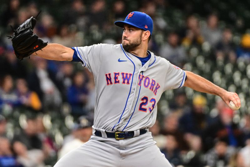 Apr 5, 2023; Milwaukee, Wisconsin, USA; New York Mets pitcher David Peterson (23) throws a pitch in the first inning against the Milwaukee Brewers at American Family Field. Mandatory Credit: Benny Sieu-USA TODAY Sports