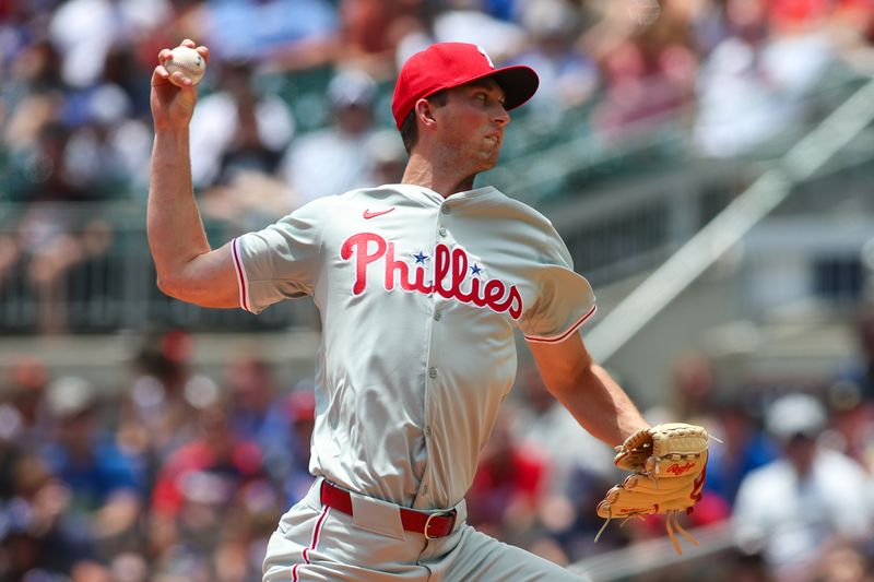 Jul 7, 2024; Atlanta, Georgia, USA; Philadelphia Phillies starting pitcher Michael Mercado (63) throws against the Atlanta Braves in the first inning at Truist Park. Mandatory Credit: Brett Davis-USA TODAY Sports