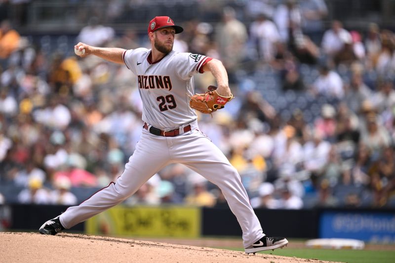 Aug 19, 2023; San Diego, California, USA; Arizona Diamondbacks starting pitcher Merrill Kelly (29) throws a pitch against the San Diego Padres during the first inning at Petco Park. Mandatory Credit: Orlando Ramirez-USA TODAY Sports