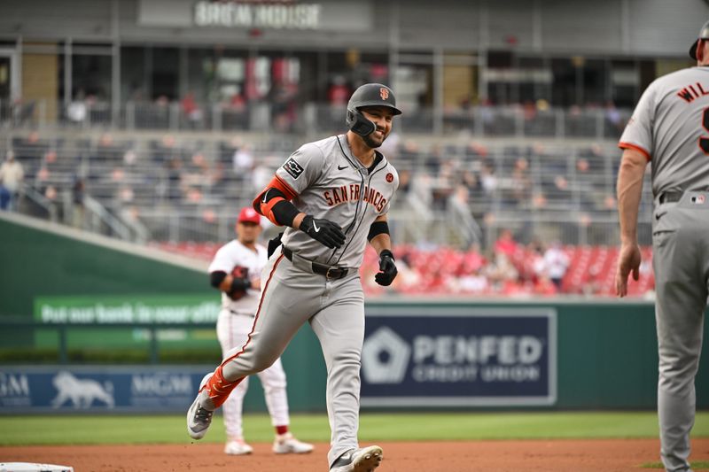 Aug 6, 2024; Washington, District of Columbia, USA; San San Francisco Giants left fielder Michael Conforto (8) smiles as he rounds third base after hitting a three run home run against the Washington Nationals during the first inning at Nationals Park. Mandatory Credit: Rafael Suanes-USA TODAY Sports