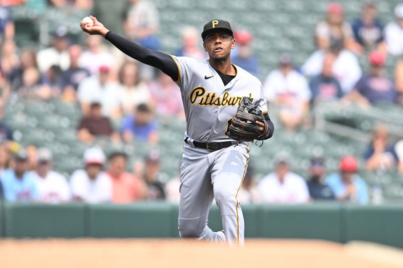 Aug 20, 2023; Minneapolis, Minnesota, USA; Pittsburgh Pirates third baseman Ke'Bryan Hayes (13) makes a putout during the first inning against the Minnesota Twins at Target Field. Mandatory Credit: Jeffrey Becker-USA TODAY Sports