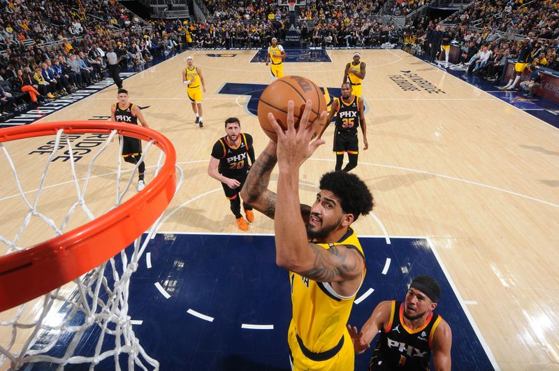 INDIANAPOLIS, IN - JANUARY 26: Obi Toppin #1 of the Indiana Pacers drives to the basket during the game against the Phoenix Suns on January 26, 2024 at Gainbridge Fieldhouse in Indianapolis, Indiana. NOTE TO USER: User expressly acknowledges and agrees that, by downloading and or using this Photograph, user is consenting to the terms and conditions of the Getty Images License Agreement. Mandatory Copyright Notice: Copyright 2024 NBAE (Photo by Ron Hoskins/NBAE via Getty Images)