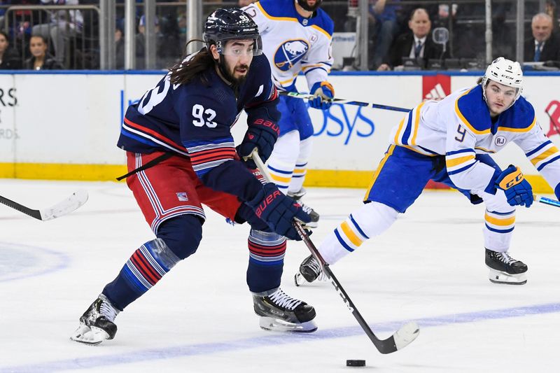 Dec 23, 2023; New York, New York, USA; New York Rangers center Mika Zibanejad (93) skates across the blue line against the Buffalo Sabres during the first period at Madison Square Garden. Mandatory Credit: Dennis Schneidler-USA TODAY Sports