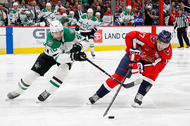 Oct 17, 2024; Washington, District of Columbia, USA; Washington Capitals center Dylan Strome (17) and Dallas Stars defenseman Ilya Lyubushkin (46) in the third period at Capital One Arena. Mandatory Credit: Geoff Burke-Imagn Images