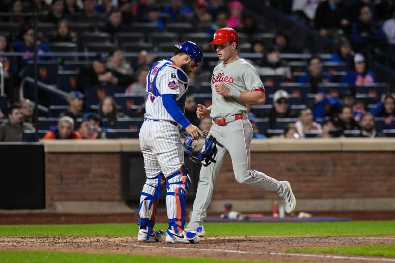 Apr 21, 2025; New York City, New York, USA; Philadelphia Phillies outfielder Max Kepler (17) scores on a RBI single by Philadelphia Phillies catcher J.T. Realmuto (not pictured)  during the ninth inning against the New York Mets at Citi Field. Mandatory Credit: John Jones-Imagn Images
