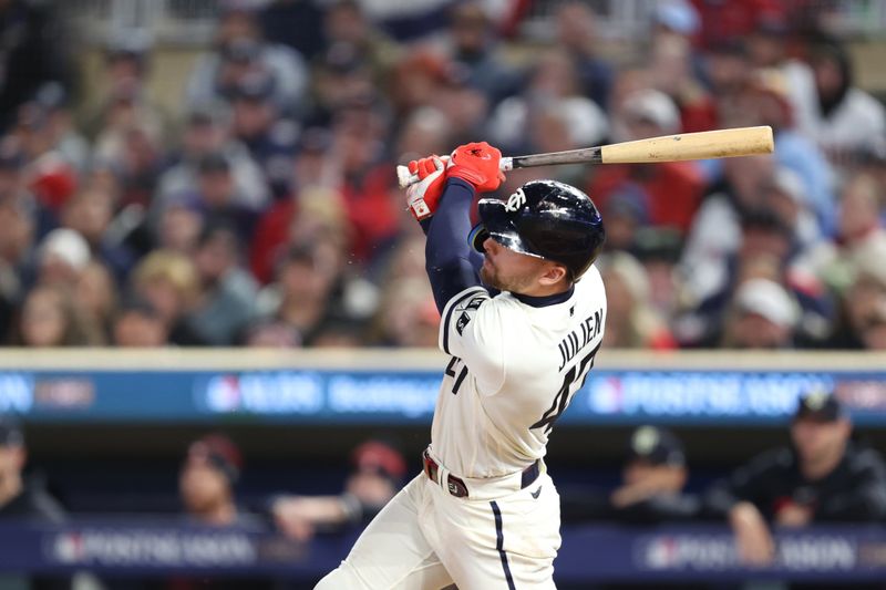 Oct 11, 2023; Minneapolis, Minnesota, USA; Minnesota Twins second baseman Edouard Julien (47) hits  solo home-run in the sixth inning against the Houston Astros during game four of the ALDS for the 2023 MLB playoffs at Target Field. Mandatory Credit: Jesse Johnson-USA TODAY Sports