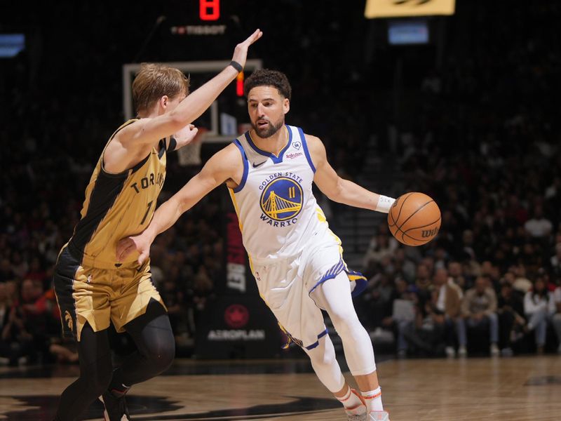 TORONTO, CANADA - MARCH 1:  Klay Thompson #11 of the Golden State Warriors goes to the basket during the game on March 1, 2024 at the Scotiabank Arena in Toronto, Ontario, Canada.  NOTE TO USER: User expressly acknowledges and agrees that, by downloading and or using this Photograph, user is consenting to the terms and conditions of the Getty Images License Agreement.  Mandatory Copyright Notice: Copyright 2024 NBAE (Photo by Mark Blinch/NBAE via Getty Images)