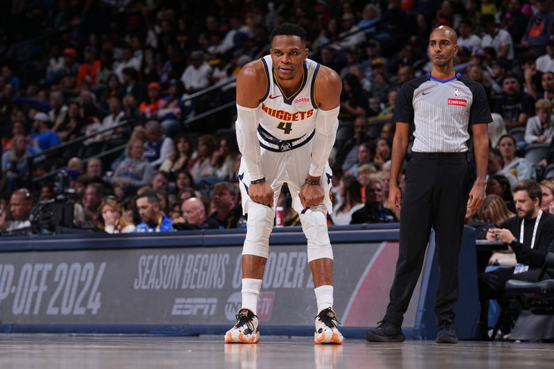 DENVER, CO - OCTOBER 13: Russell Westbrook #4 of the Denver Nuggets looks on during the game against the Phoenix Suns on October 13, 2024 at Ball Arena in Denver, Colorado. NOTE TO USER: User expressly acknowledges and agrees that, by downloading and/or using this Photograph, user is consenting to the terms and conditions of the Getty Images License Agreement. Mandatory Copyright Notice: Copyright 2024 NBAE (Photo by Bart Young/NBAE via Getty Images)