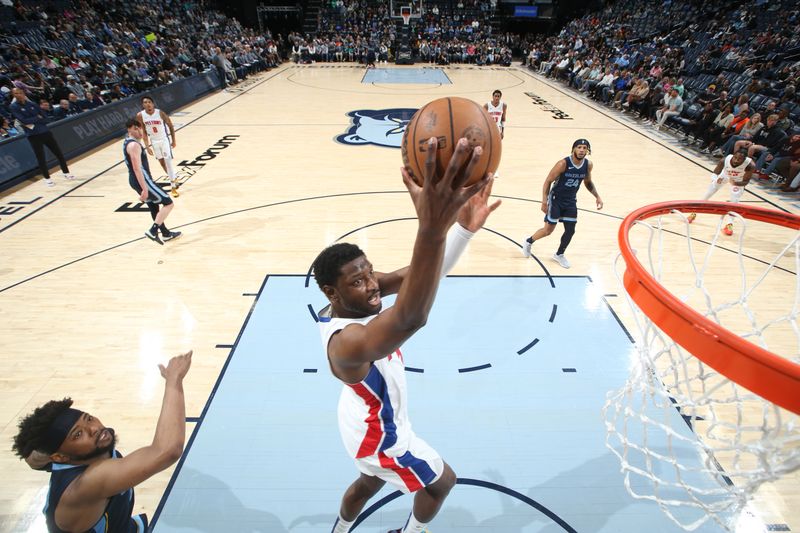 MEMPHIS, TN - APRIL 5: Chimezie Metu #5 of the Detroit Pistons drives to the basket during the game against the Memphis Grizzlies on April 5, 2024 at FedExForum in Memphis, Tennessee. NOTE TO USER: User expressly acknowledges and agrees that, by downloading and or using this photograph, User is consenting to the terms and conditions of the Getty Images License Agreement. Mandatory Copyright Notice: Copyright 2024 NBAE (Photo by Joe Murphy/NBAE via Getty Images)