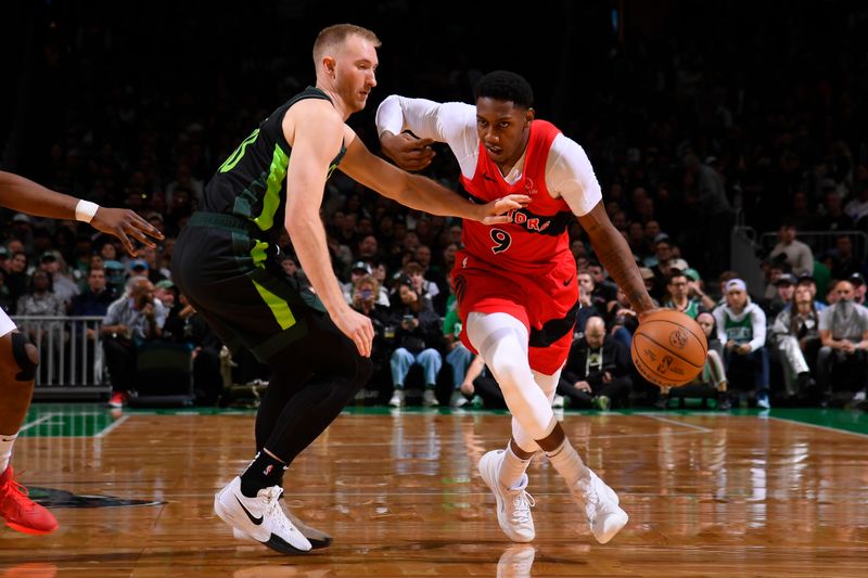 BOSTON, MA - NOVEMBER 16: RJ Barrett #9 of the Toronto Raptors dribbles the ball during the game against the Boston Celtics on November 16, 2024 at TD Garden in Boston, Massachusetts. NOTE TO USER: User expressly acknowledges and agrees that, by downloading and/or using this Photograph, user is consenting to the terms and conditions of the Getty Images License Agreement. Mandatory Copyright Notice: Copyright 2024 NBAE (Photo by Brian Babineau/NBAE via Getty Images)