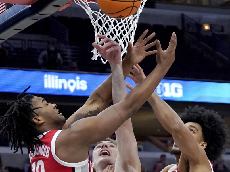 Mar 8, 2023; Chicago, IL, USA; Ohio State Buckeyes forward Brice Sensabaugh (10) defends Wisconsin Badgers forward Tyler Wahl (5) during the first half at United Center. Mandatory Credit: David Banks-USA TODAY Sports