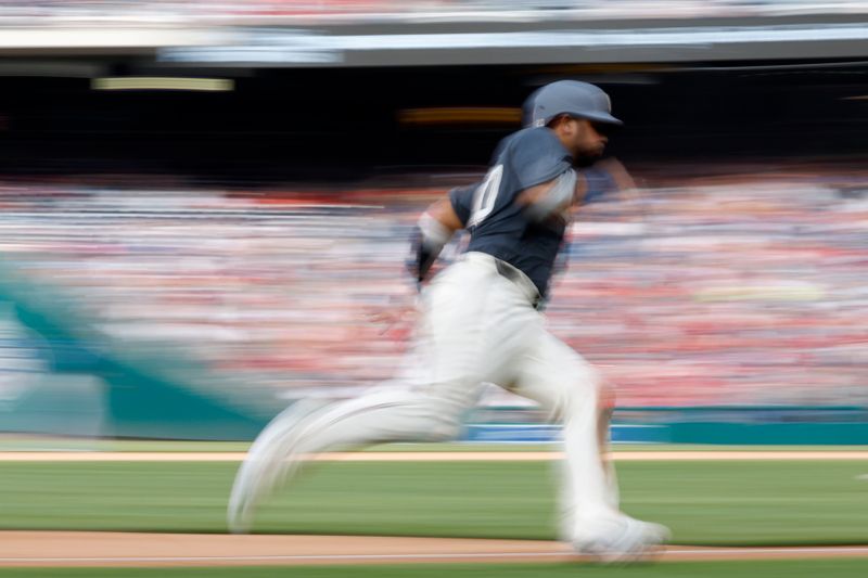 May 25, 2024; Washington, District of Columbia, USA; Washington Nationals catcher Keibert Ruiz (20) rounds this base en route to scoring a run on a single by Nationals first baseman Joey Gallo (not pictured) against the Seattle Mariners during the seventh inning at Nationals Park. Mandatory Credit: Geoff Burke-USA TODAY Sports