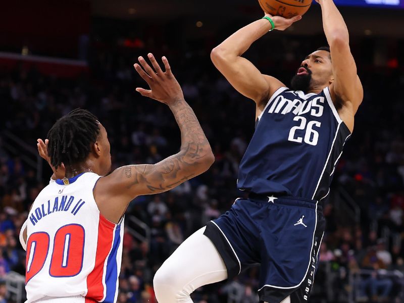 DETROIT, MICHIGAN - JANUARY 31: Spencer Dinwiddie #26 of the Dallas Mavericks takes a first half shot over Ronald Holland II #00 of the Detroit Pistons at Little Caesars Arena on January 31, 2025 in Detroit, Michigan. NOTE TO USER: User expressly acknowledges and agrees that, by downloading and or using this photograph, User is consenting to the terms and conditions of the Getty Images License. (Photo by Gregory Shamus/Getty Images)