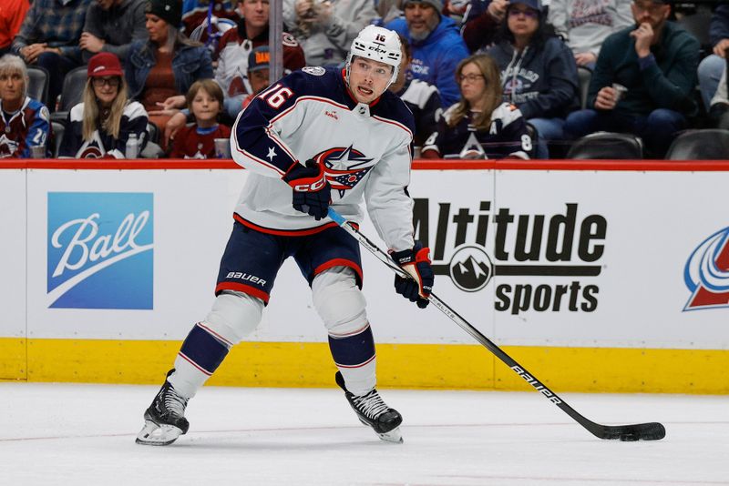 Mar 22, 2024; Denver, Colorado, USA; Columbus Blue Jackets center Brendan Gaunce (16) controls the puck in the second period against the Colorado Avalanche at Ball Arena. Mandatory Credit: Isaiah J. Downing-USA TODAY Sports