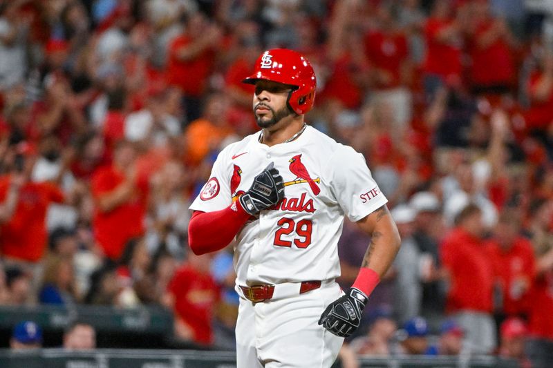 Jul 30, 2024; St. Louis, Missouri, USA;  St. Louis Cardinals pinch hitter Tommy Pham (29) reacts as he runs the bases after hitting a grand slam home run against the Texas Rangers during the fifth inning at Busch Stadium. Mandatory Credit: Jeff Curry-USA TODAY Sports