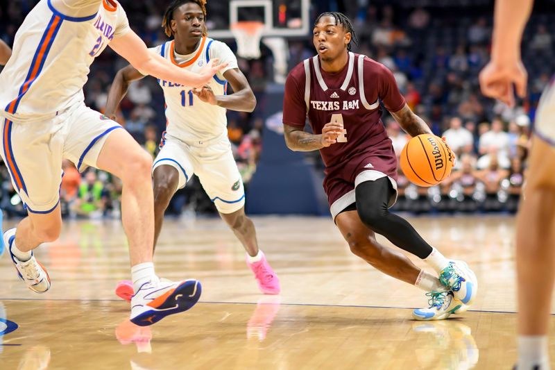 Mar 16, 2024; Nashville, TN, USA;  dTexas A&M Aggies guard Wade Taylor IV (4) dribbles against the Florida Gators uring the first half at Bridgestone Arena. Mandatory Credit: Steve Roberts-USA TODAY Sports