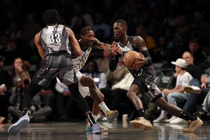 NEW YORK, NEW YORK - DECEMBER 04: Dennis Schroder #17 of the Brooklyn Nets dribbles against Quenton Jackson #29 of the Indiana Pacers during the first half at Barclays Center on December 04, 2024 in the Brooklyn borough of New York City. NOTE TO USER: User expressly acknowledges and agrees that, by downloading and or using this photograph, User is consenting to the terms and conditions of the Getty Images License Agreement. (Photo by Sarah Stier/Getty Images)