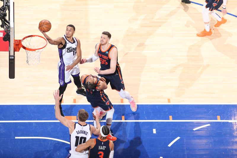 NEW YORK, NY - APRIL 4: Keegan Murray #13 of the Sacramento Kings drives to the basket during the game against the New York Knicks on April 4, 2024 at Madison Square Garden in New York City, New York.  NOTE TO USER: User expressly acknowledges and agrees that, by downloading and or using this photograph, User is consenting to the terms and conditions of the Getty Images License Agreement. Mandatory Copyright Notice: Copyright 2024 NBAE  (Photo by Nathaniel S. Butler/NBAE via Getty Images)