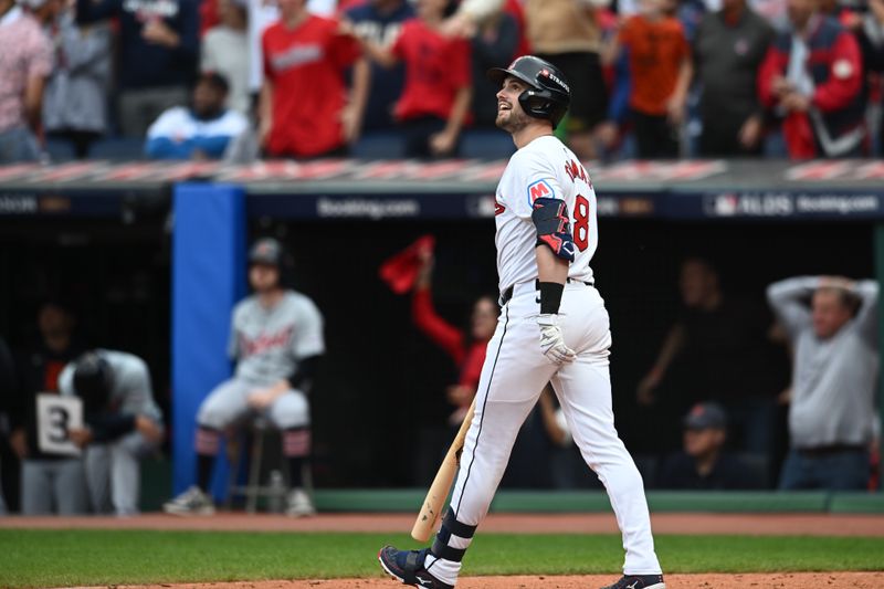 Oct 12, 2024; Cleveland, Ohio, USA; Cleveland Guardians outfielder Lane Thomas (8) hits grand slam in the fifth inning against the Detroit Tigers during game five of the ALDS for the 2024 MLB Playoffs at Progressive Field. Mandatory Credit: Ken Blaze-Imagn Images