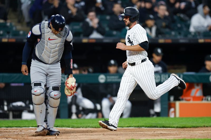 May 9, 2024; Chicago, Illinois, USA; Chicago White Sox shortstop Paul DeJong (29) scores against the Cleveland Guardians during the second inning at Guaranteed Rate Field. Mandatory Credit: Kamil Krzaczynski-USA TODAY Sports