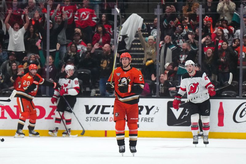 Dec 31, 2024; Anaheim, California, USA; Anaheim Ducks defenseman Jackson LaCombe (2) reacts at the end of the game against the New Jersey Devils at Honda Center. Mandatory Credit: Kirby Lee-Imagn Images