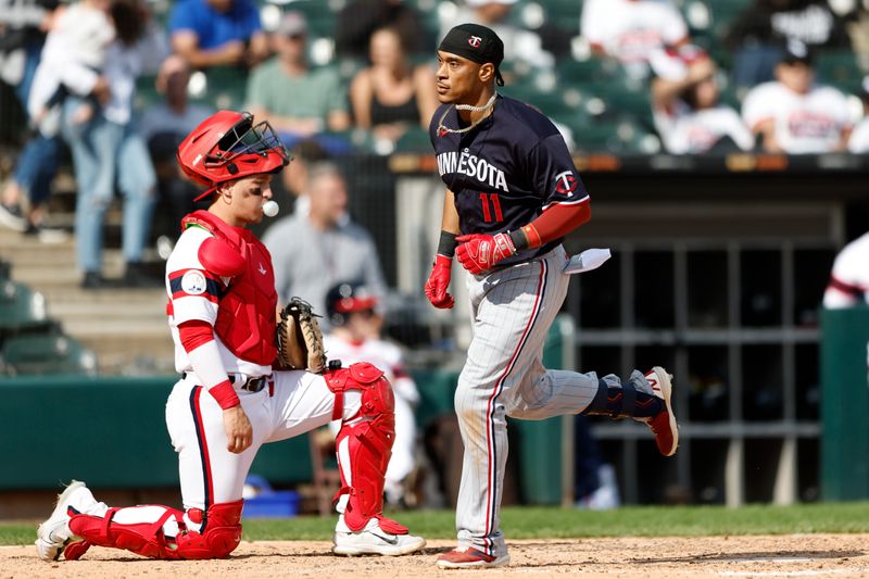 Sep 17, 2023; Chicago, Illinois, USA; Minnesota Twins second baseman Jorge Polanco (11) crosses home plate after hitting a solo home run against the Chicago White Sox during the eight inning at Guaranteed Rate Field. Mandatory Credit: Kamil Krzaczynski-USA TODAY Sports