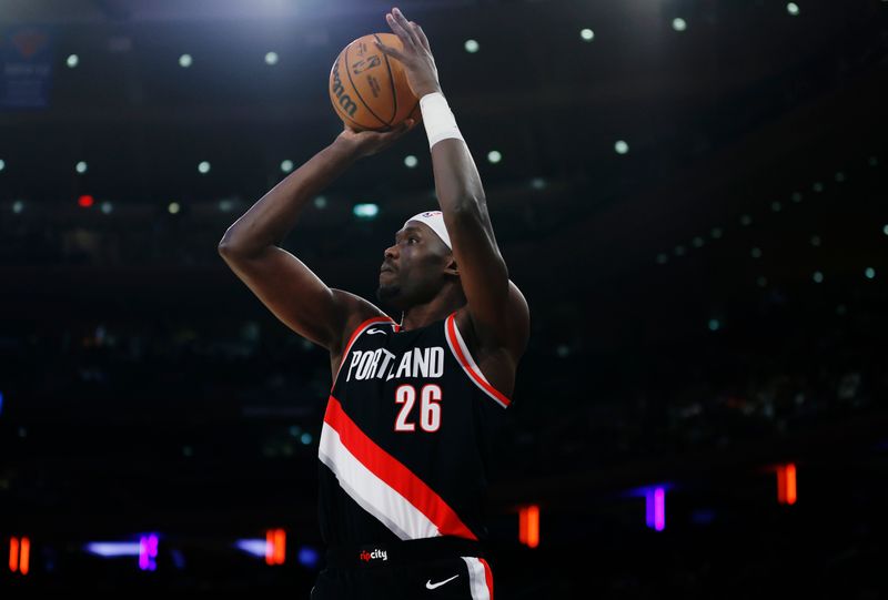 NEW YORK, NEW YORK - JANUARY 09: Duop Reath #26 of the Portland Trail Blazers shoots the ball during the first half against the New York Knicks at Madison Square Garden on January 09, 2024 in New York City. NOTE TO USER: User expressly acknowledges and agrees that, by downloading and/or using this Photograph, user is consenting to the terms and conditions of the Getty Images License Agreement. (Photo by Sarah Stier/Getty Images)