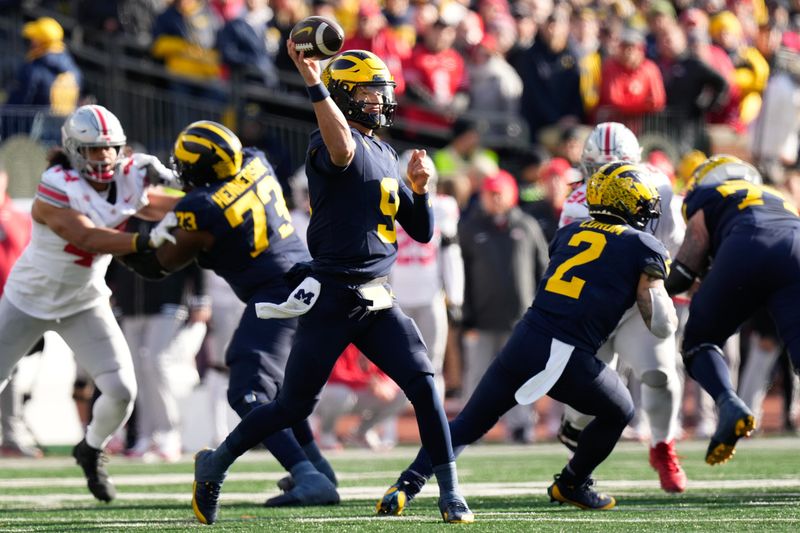 Nov 25, 2023; Ann Arbor, Michigan, USA; Michigan Wolverines quarterback J.J. McCarthy (9) throws a pass during the NCAA football game against the Ohio State Buckeyes at Michigan Stadium. Ohio State lost 30-24. Mandatory Credit: Adam Cairns-USA TODAY Sports