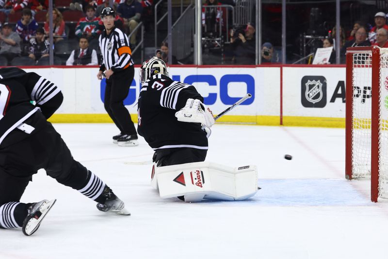 Apr 15, 2024; Newark, New Jersey, USA; New York Islanders center Jean-Gabriel Pageau (44) (not shown) scores a goal against the New Jersey Devils during the first period at Prudential Center. Mandatory Credit: Ed Mulholland-USA TODAY Sports