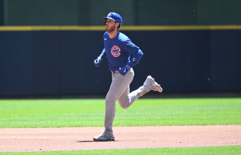 May 30, 2024; Milwaukee, Wisconsin, USA; Chicago Cubs outfielder Cody Bellinger (24) rounds the bases after hitting a home run against Milwaukee Brewers in the first inning at American Family Field. Mandatory Credit: Michael McLoone-USA TODAY Sports