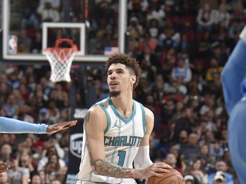 CLEVELAND, OH - NOVEMBER 17: LaMelo Ball #1 of the Charlotte Hornets shoots the ball during the game against the Cleveland Cavaliers on November 17, 2024 at Rocket Mortgage FieldHouse in Cleveland, Ohio. NOTE TO USER: User expressly acknowledges and agrees that, by downloading and/or using this Photograph, user is consenting to the terms and conditions of the Getty Images License Agreement. Mandatory Copyright Notice: Copyright 2024 NBAE (Photo by David Liam Kyle/NBAE via Getty Images)