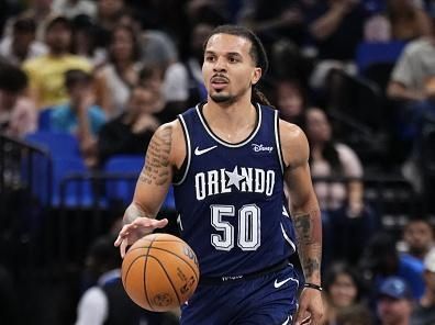 ORLANDO, FLORIDA - NOVEMBER 21: Cole Anthony #50 of the Orlando Magic dribbles the ball up the court against the Toronto Raptors during the first half of an NBA In-Season Tournament game at Amway Center on November 21, 2023 in Orlando, Florida. NOTE TO USER: User expressly acknowledges and agrees that, by downloading and or using this photograph, User is consenting to the terms and conditions of the Getty Images License Agreement. (Photo by Rich Storry/Getty Images)