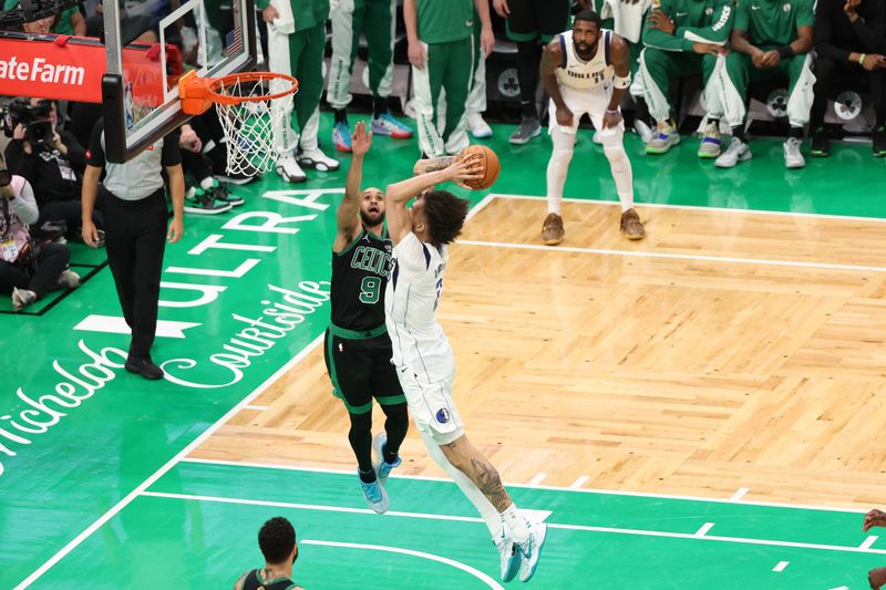 BOSTON, MA - JUNE 9: Dereck Lively II #2 of the Dallas Mavericks dunks the ball during the game against the Boston Celtics during Game 2 of the 2024 NBA Finals on June 9, 2024 at the TD Garden in Boston, Massachusetts. NOTE TO USER: User expressly acknowledges and agrees that, by downloading and or using this photograph, User is consenting to the terms and conditions of the Getty Images License Agreement. Mandatory Copyright Notice: Copyright 2024 NBAE  (Photo by Joe Murphy/NBAE via Getty Images)