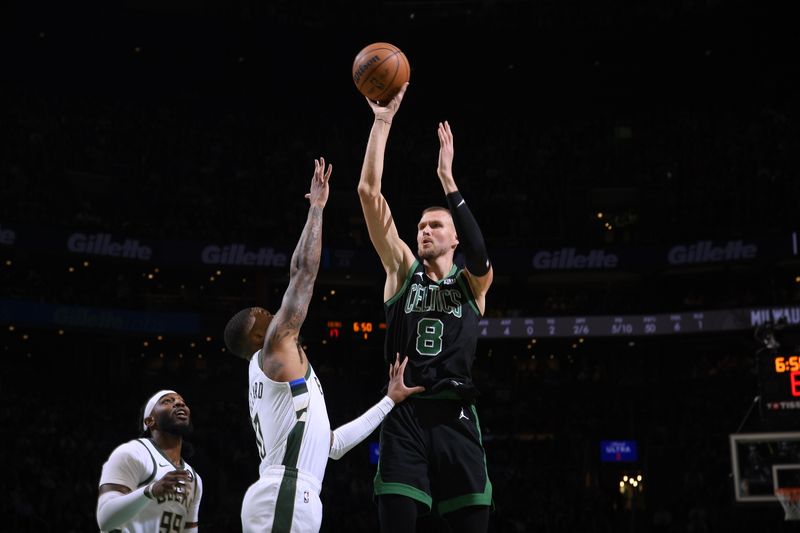 BOSTON, MA - MARCH 20: Kristaps Porzingis #8 of the Boston Celtics shoots the ball during the game against the Milwaukee Bucks on March 20, 2024 at the TD Garden in Boston, Massachusetts. NOTE TO USER: User expressly acknowledges and agrees that, by downloading and or using this photograph, User is consenting to the terms and conditions of the Getty Images License Agreement. Mandatory Copyright Notice: Copyright 2024 NBAE  (Photo by Brian Babineau/NBAE via Getty Images)