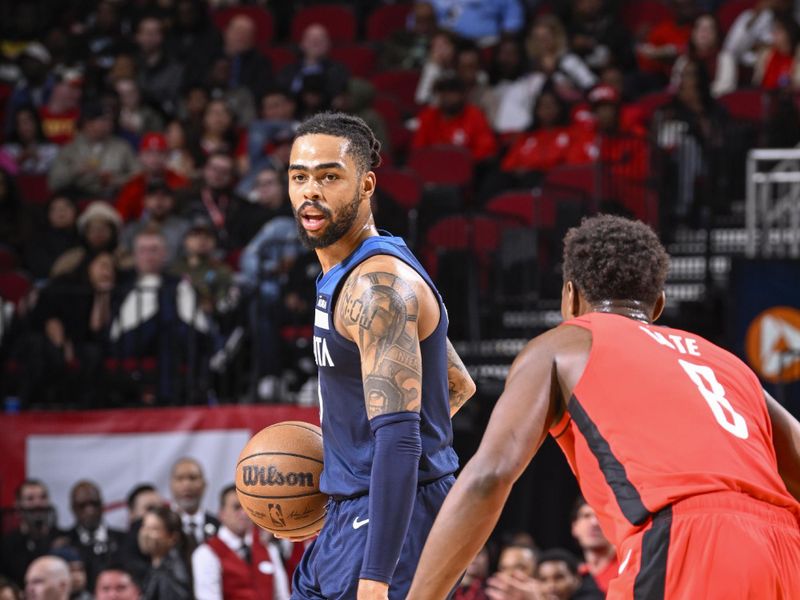 HOUSTON, TX - JANUARY 23:   D'Angelo Russell #0 of the Minnesota Timberwolves drives to the basket during the game against the  Houston Rockets on January 23, 2023 at the Toyota Center in Houston, Texas. NOTE TO USER: User expressly acknowledges and agrees that, by downloading and or using this photograph, User is consenting to the terms and conditions of the Getty Images License Agreement. Mandatory Copyright Notice: Copyright 2023 NBAE (Photo by Logan Riely/NBAE via Getty Images)