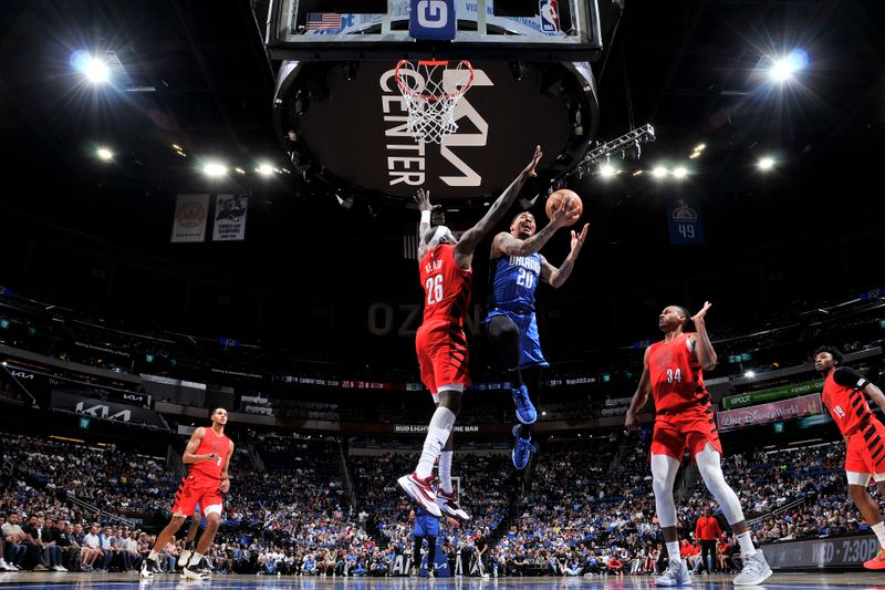 ORLANDO, FL - APRIL 1: Markelle Fultz #20 of the Orlando Magic grabs a rebound during the game against the Portland Trail Blazers on April 1, 2024 at Kia Center in Orlando, Florida. NOTE TO USER: User expressly acknowledges and agrees that, by downloading and or using this photograph, User is consenting to the terms and conditions of the Getty Images License Agreement. Mandatory Copyright Notice: Copyright 2024 NBAE (Photo by Fernando Medina/NBAE via Getty Images)