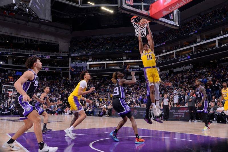 SACRAMENTO, CA - MARCH 13:  Max Christie #10 of the Los Angeles Lakers drives to the basket during the game against the Sacramento Kings on March 13, 2024 at Golden 1 Center in Sacramento, California. NOTE TO USER: User expressly acknowledges and agrees that, by downloading and or using this Photograph, user is consenting to the terms and conditions of the Getty Images License Agreement. Mandatory Copyright Notice: Copyright 2024 NBAE (Photo by Rocky Widner/NBAE via Getty Images)