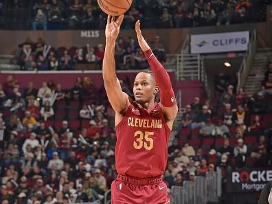 CLEVELAND, OH - DECEMBER 20: Isaac Okoro #35 of the Cleveland Cavaliers shoots a three point basket during the game against the Utah Jazz on December 20, 2023 at Rocket Mortgage FieldHouse in Cleveland, Ohio. NOTE TO USER: User expressly acknowledges and agrees that, by downloading and/or using this Photograph, user is consenting to the terms and conditions of the Getty Images License Agreement. Mandatory Copyright Notice: Copyright 2023 NBAE (Photo by David Liam Kyle/NBAE via Getty Images)