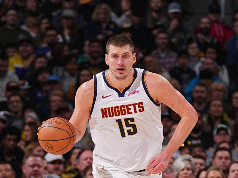 DENVER, CO - FEBRUARY 4: Nikola Jokic #15 of the Denver Nuggets dribbles the ball during the game against the Portland Trail Blazers on February 4, 2024 at the Ball Arena in Denver, Colorado. NOTE TO USER: User expressly acknowledges and agrees that, by downloading and/or using this Photograph, user is consenting to the terms and conditions of the Getty Images License Agreement. Mandatory Copyright Notice: Copyright 2024 NBAE (Photo by Bart Young/NBAE via Getty Images)