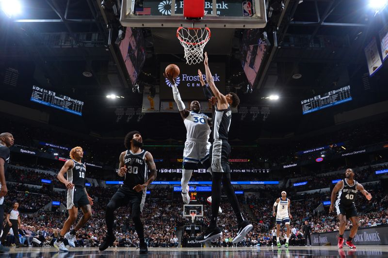 SAN ANTONIO, TX - NOVEMBER 2: Julius Randle #30 of the Minnesota Timberwolves drives to the basket during the game against the San Antonio Spurs on November 2, 2024 at the Frost Bank Center in San Antonio, Texas. NOTE TO USER: User expressly acknowledges and agrees that, by downloading and or using this photograph, user is consenting to the terms and conditions of the Getty Images License Agreement. Mandatory Copyright Notice: Copyright 2024 NBAE (Photos by Michael Gonzales/NBAE via Getty Images)