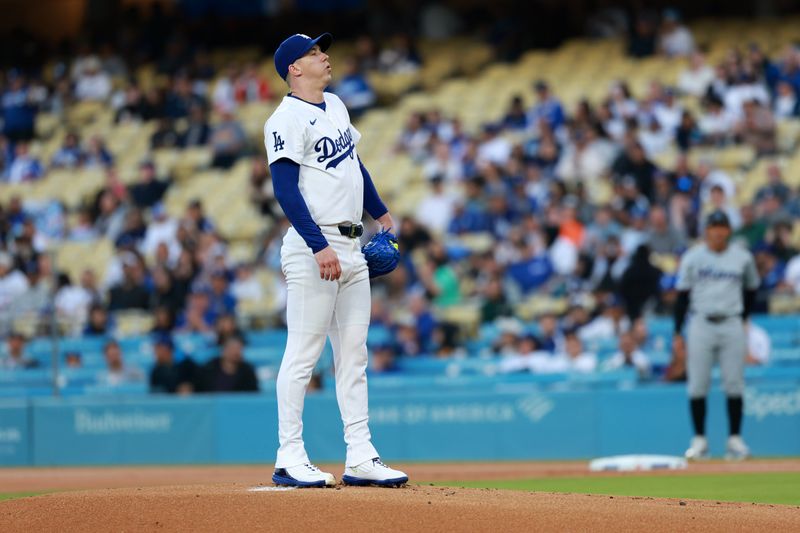 May 6, 2024; Los Angeles, California, USA;  Los Angeles Dodgers starting pitcher Walker Buehler (21) on the pitcher's mound prior to the MLB game against the Miami Marlins at Dodger Stadium. Mandatory Credit: Kiyoshi Mio-USA TODAY Sports