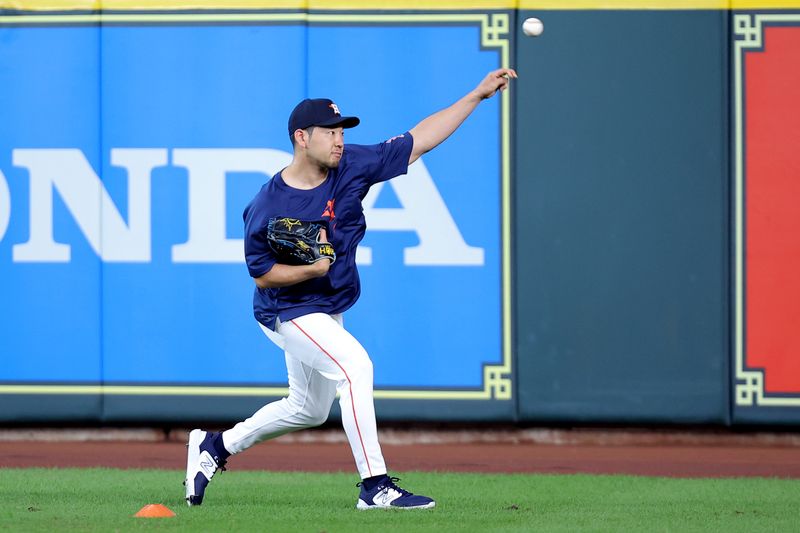Jul 31, 2024; Houston, Texas, USA; Houston Astros starting pitcher Yusei Kikuchi (16) works out prior to a game against the Pittsburgh Pirates at Minute Maid Park. Mandatory Credit: Erik Williams-USA TODAY Sports
