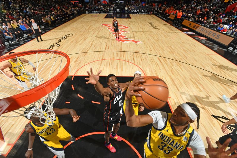 DETROIT, MI - MARCH 20: Myles Turner #33 of the Indiana Pacers rebounds the ball during the game against the Detroit Pistons on March 20, 2024 at Little Caesars Arena in Detroit, Michigan. NOTE TO USER: User expressly acknowledges and agrees that, by downloading and/or using this photograph, User is consenting to the terms and conditions of the Getty Images License Agreement. Mandatory Copyright Notice: Copyright 2024 NBAE (Photo by Chris Schwegler/NBAE via Getty Images)