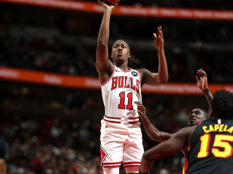 CHICAGO, IL - JANUARY 15: Ayo Dosunmu #11 of the Chicago Bulls shoots the ball during the game against the Atlanta Hawks on January 15, 2025 at United Center in Chicago, Illinois. NOTE TO USER: User expressly acknowledges and agrees that, by downloading and or using this photograph, User is consenting to the terms and conditions of the Getty Images License Agreement. Mandatory Copyright Notice: Copyright 2025 NBAE (Photo by Jeff Haynes/NBAE via Getty Images)