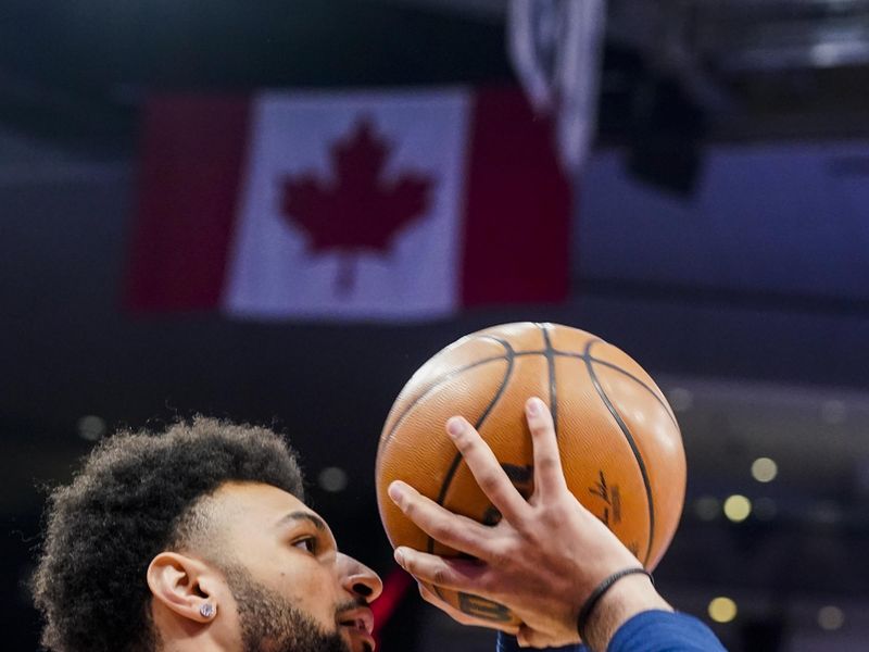 TORONTO, CANADA - MARCH 14: Jamal Murray #27 of the Denver Nuggets warms up before the game against the Toronto Raptors on march 14, 2023 at the Scotiabank Arena in Toronto, Ontario, Canada. NOTE TO USER: User expressly acknowledges and agrees that, by downloading and or using this Photograph, user is consenting to the terms and conditions of the Getty Images License Agreement.  Mandatory Copyright Notice: Copyright 2023 NBAE (Photo by Mark Blinch/NBAE via Getty Images)